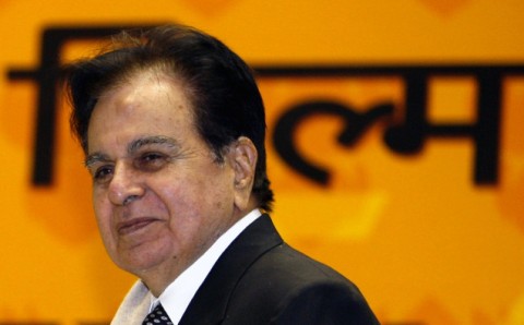 Bollywood star Dilip Kumar smiles after receiving award in New Delhi